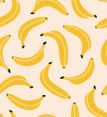Seamless pattern of bananas isolated on beige. Colored fruit. Concept of tropical fruits, healthy eating, healthy sweets, vitamins.
