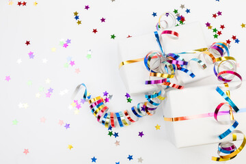 Festive decorations and notebook with wish list on white background , flat lay . Planning concept.- Image