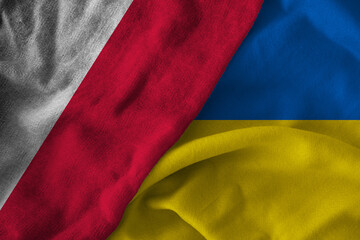 Concept of the relationship between Ukraine and Poland with two flags over each other