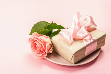 Romantic dinner table isolated on rose background. Love concept for Valentine's or Mother's day