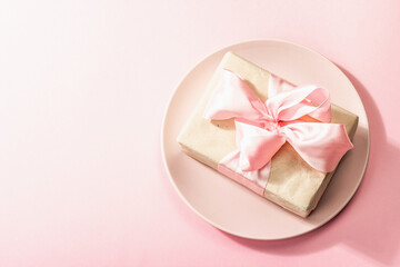 Romantic dinner table isolated on rose background. Love concept for Valentine's or Mother's day