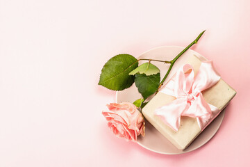 Romantic dinner table isolated on rose background. Love concept for Valentine's or Mother's day