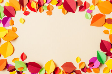 Top view of a frame with colorful paper autumn leaves. Copy space. Autumn season, school time