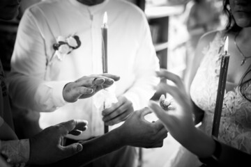 Holding wedding rings. Noble metal jewellery for married couples.Wedding ceremony and planing.Holding traditional bridal commitment jewellery.Golden ring for bride and groom.Marriage proposal exchange