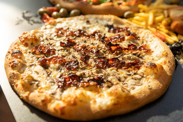 Bacon pizza served in the restaurant