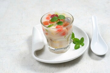 Es buah or sop buah-is an Indonesian iced fruit cocktail dessert. This cold and sweet beverage is made of diced fruits mixed with shaved ice or ice cubes, and sweetened with liquid sugar or syrup.