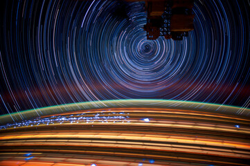 Stars in motion background, A compilation of dozens of long-exposure photos taken from space turns...