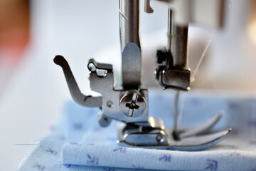 New White sewing machine with threads at home
