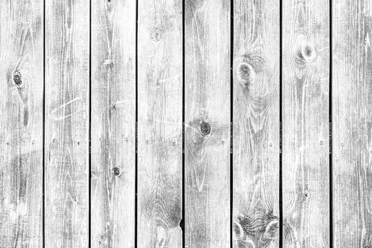 Rustic plank fence brown old bark wood textured photo. Abstract background Image. Toned photo. Copy space.