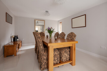 Brightly decorated dining room with tiled floor