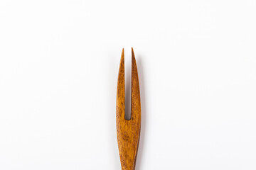 wooden fork on a white background