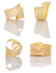 Wood shavings set on a white background with reflection. Wood shavings isolated on white background.