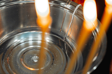 The sacrament of baptism. Three candles
