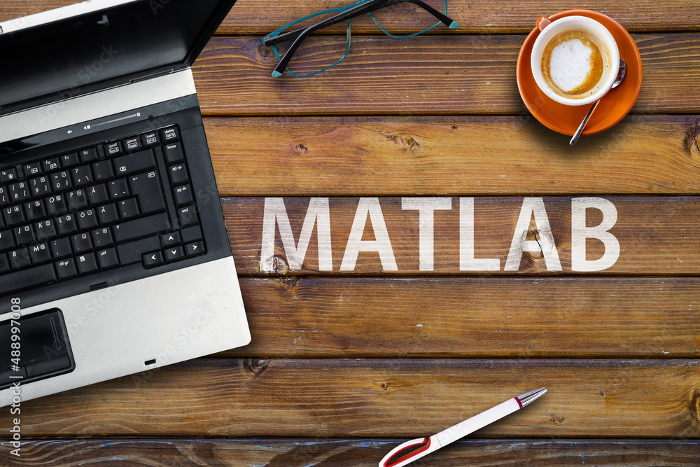 Poster Matlab Programming Language. Word Matlab on wooden desk and laptop
