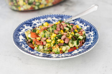 Red bean salad with corn, cucumber, tomatoes