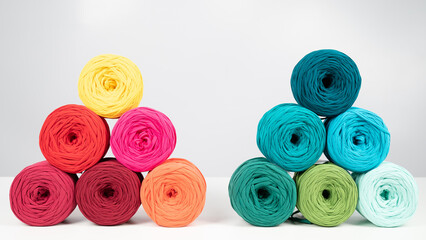 Rows of multicolored cotton yarn. The assortment of the store for needlework.