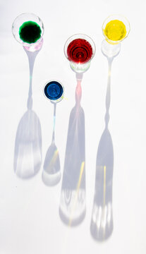 Glasses with colored liquids