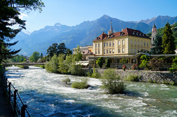 Fototapeta na wymiar picturesque Merano with the emerald-green Passer river (Italy, Region: Trentino-Alto Adige / Südtirol, Province: South Tyrol) 