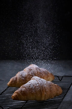 Croissant with powdered sugar