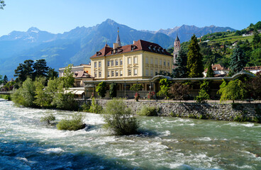 Fototapeta na wymiar picturesque Merano with the emerald-green Passer river (Italy, Region: Trentino-Alto Adige / Südtirol, Province: South Tyrol)