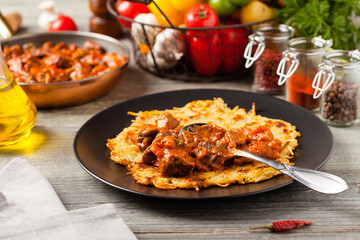 Hungarian potato pancake with goulash