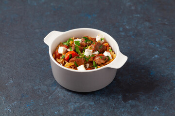 Traditional Greek cuisine. Lamb stew with feta cheese and vegetables.