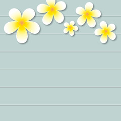 Plumeria flowers on pastel wooden background. Spring flower or springtime, spa, summer and nature concept, space for the text, paper cut design style.