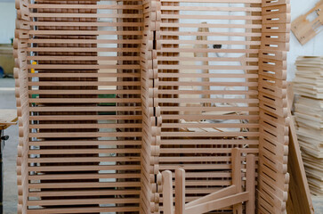 Carpentry workshop. Composition of wooden products in a woodworking workshop. Making easels....