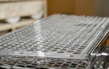 Metal cutting machine. Laser cutting. Sheet of metal after cutting. Close-up.
