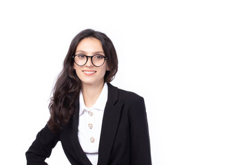 Portrait confident young attractive business woman. Confident young manager wearing black suit looking friendly and smiling isolated on white background. Business woman concept.