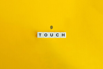 Touch Word on Letter Tiles and Fingertip Icon on Yellow Background. Minimal Aesthetics.