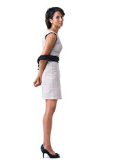 Fototapeta premium Struggling against corporate restrictions. Studio portrait of a businesswoman tied up with ropes against a white background.
