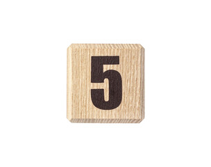 Wooden cube with number 5 isolated on white background.