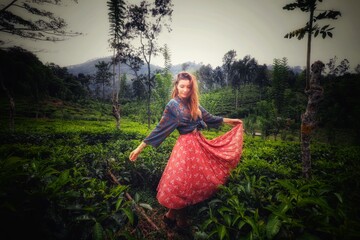 woman in a red dress in sri lanka 