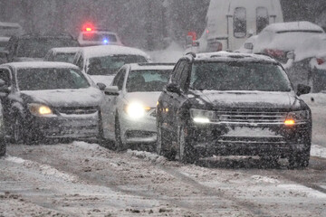 Cars in a snow storm. - 489009860