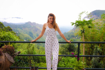 woman in a dress in the garden in sri lanka ella 