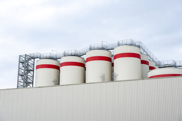 Fermentation tanks for making different types of beer in the Distillery.Giant stainless steel fermentation for industrial use.