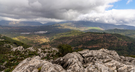 the Sierra de las Nieves mountains in southern Spain with the whitewashed village of El Burgo in the background