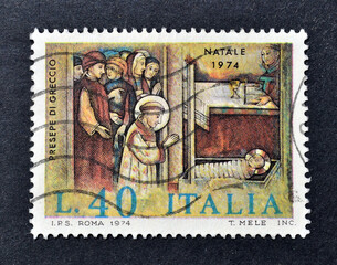 Cancelled postage stamp printed by Italy, that shows Presepe di San Franscesco in Greccio, Christmas 1974, circa 1974.