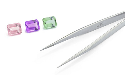 Pink, Purple and Green Amethyst Gemstones on White Background