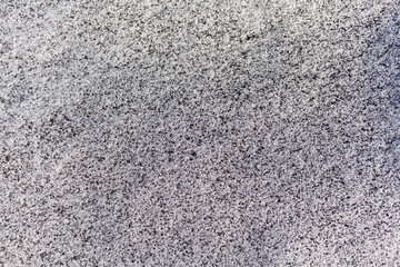 Black soot from the boiler room on white snow. Natural background. Snow mixed with coal soot, poor ecology. Environmental pollution 