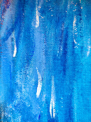 Background texture of acrylic ink in blue color.  Abstract fire paint with drops and stains.