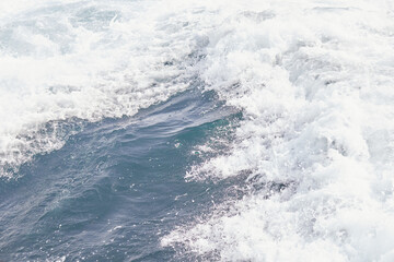 Fototapeta na wymiar Wave caused by a ship