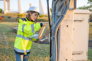 Telecommunication engineers work at cell towers for 5G cell phone signals,Network tower maintenance technicians