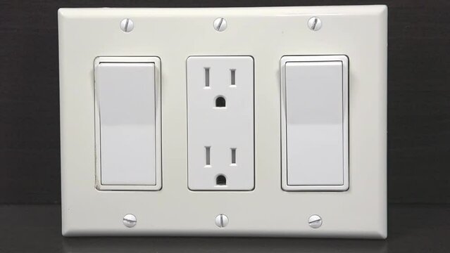 Two switches and one socket on one board