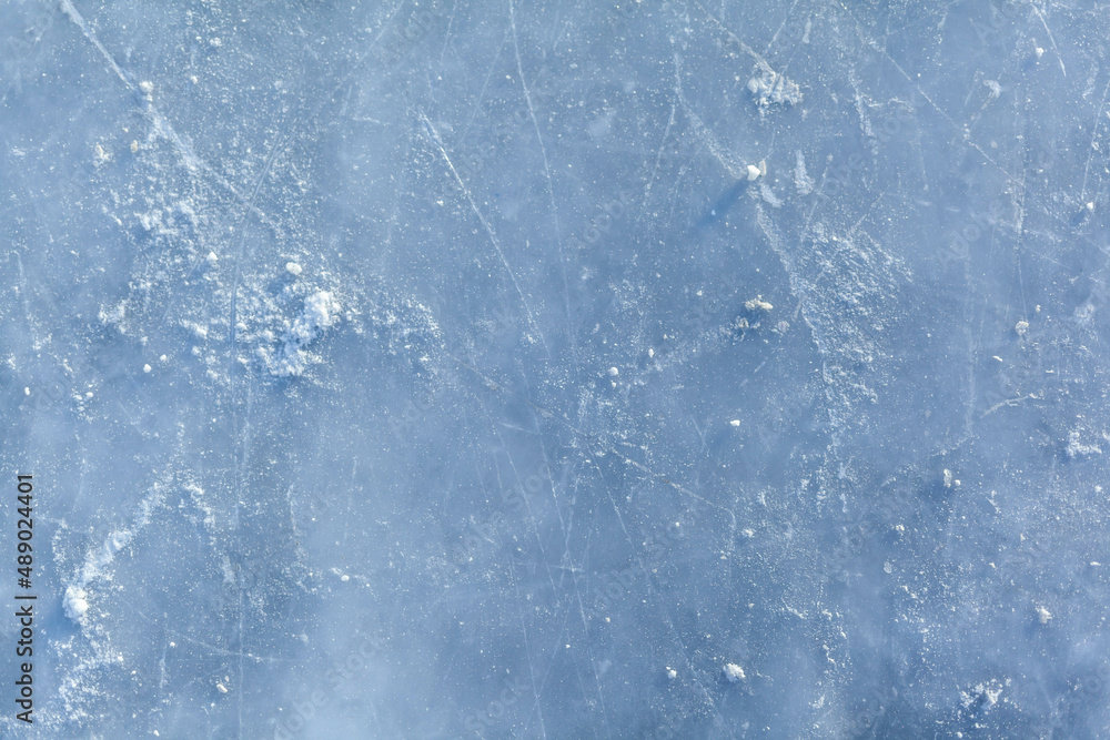 Aufkleber empty ice rink with skate marks after the session outdoor. skating ice rink texture covered with sno