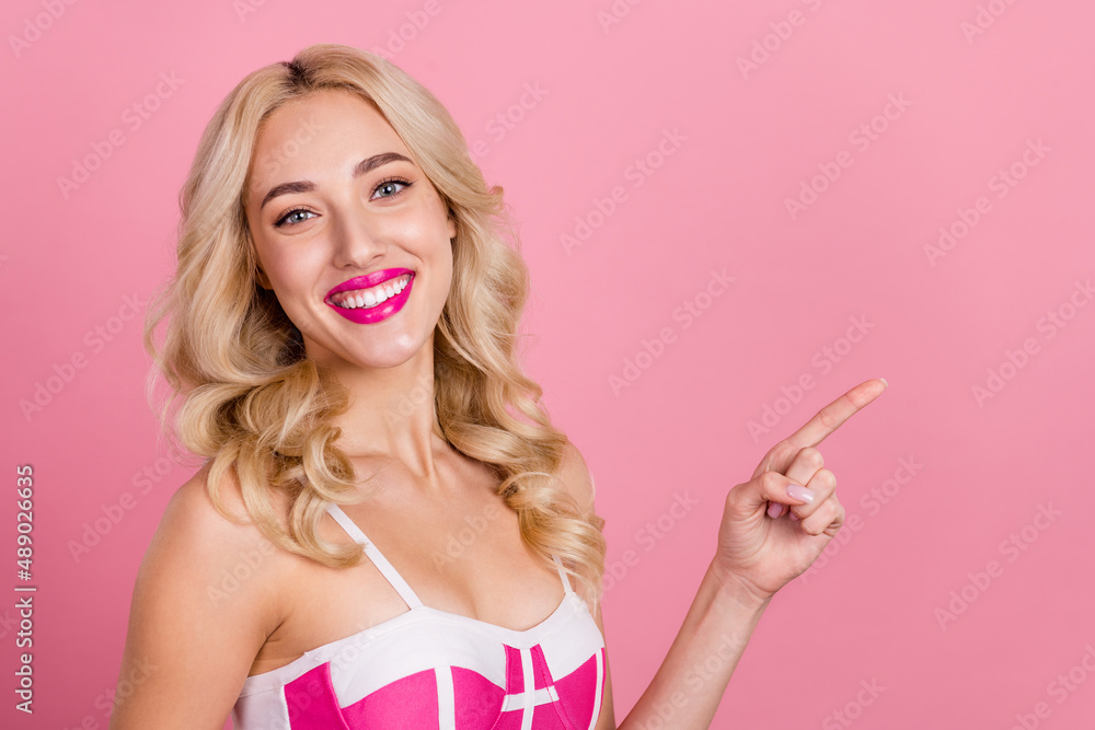 Poster portrait of attractive cheerful wavy-haired girl demonstrating copy blank space ad look idea isolate