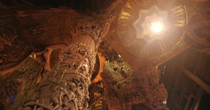 Interior Sanctuary of Truth (Prasat Sut Ja-Tum), beautiful wooden temple by the sea on the outskirts of Pattaya Thailand, Amazing Thailand travel concept.