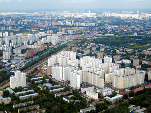 White residential high-rise buildings in Russia. Blured background.