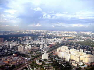 Fototapeta na wymiar A bird's eye view of the Russian city. Blurry background.